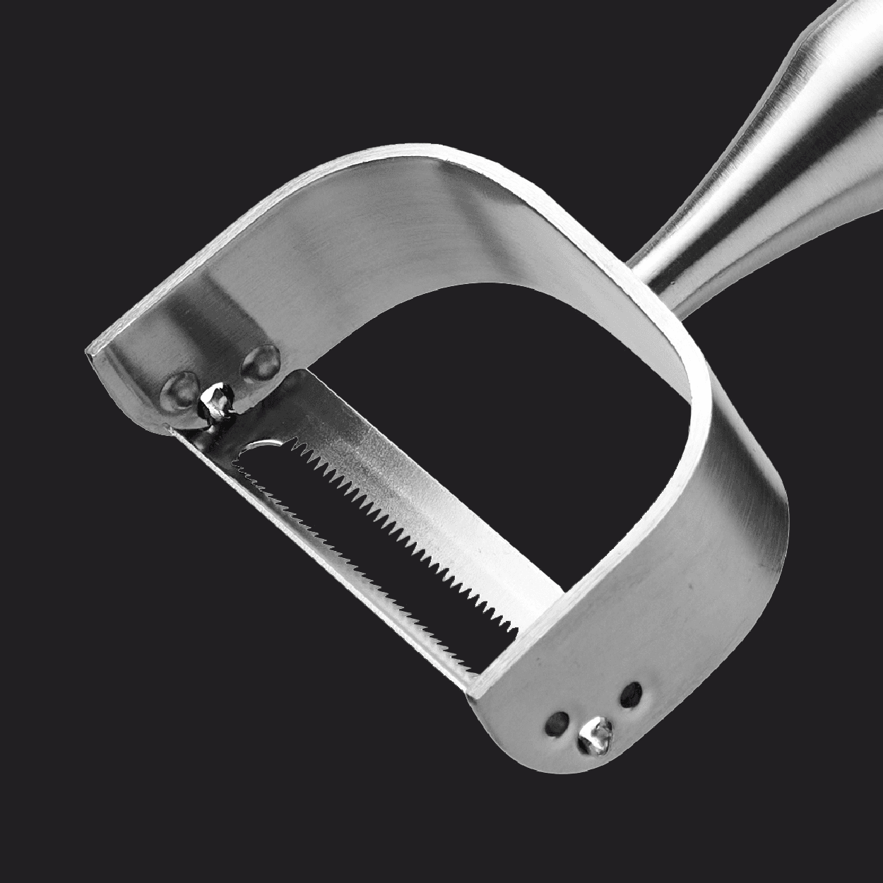 SEIDO stainless steel peeler with a serrated blade, on a dark background